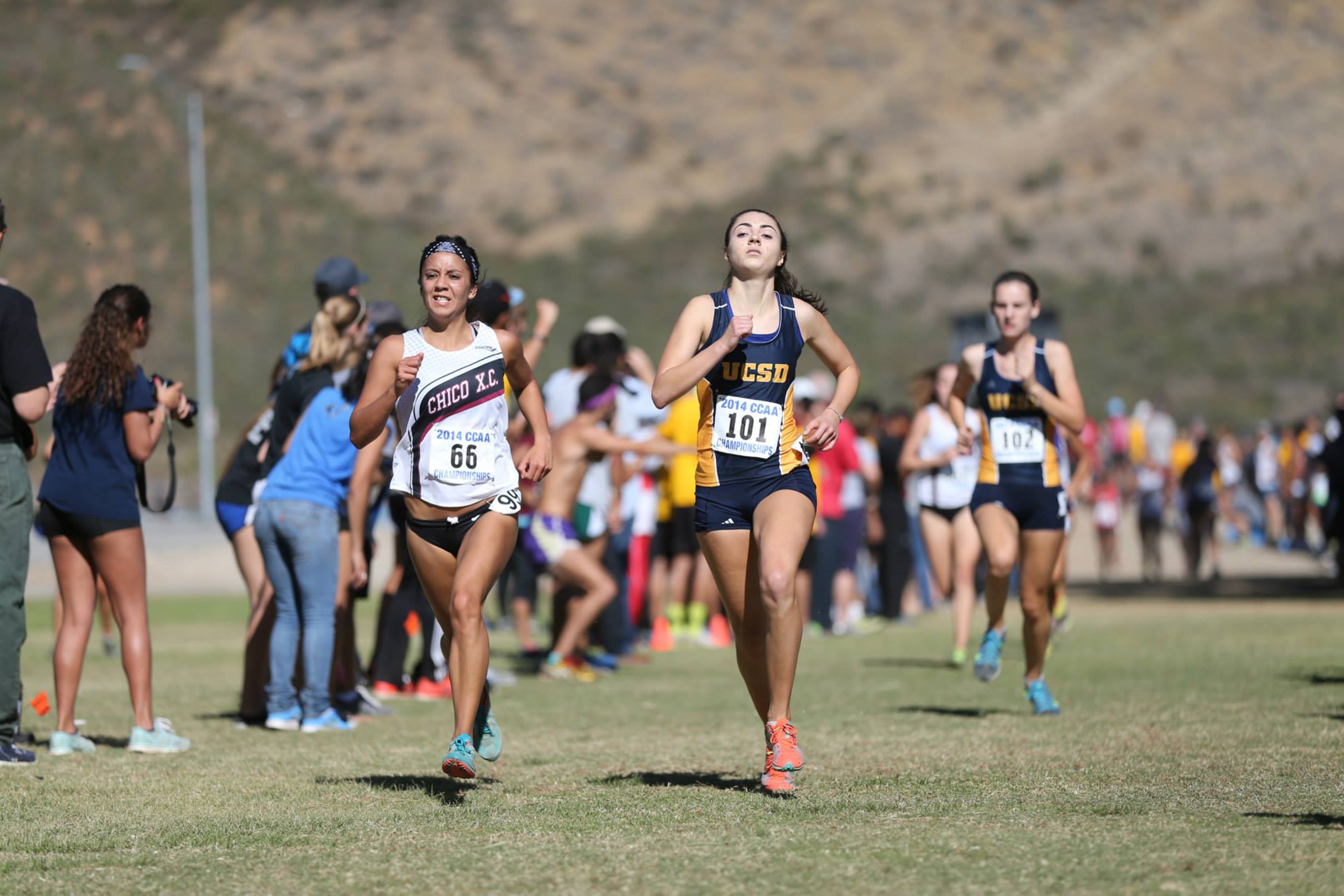 Chico State's Quetta Penedo battles UC San Diego's Corinne Hinkle (West Valley HS grad) down the finish tunnel