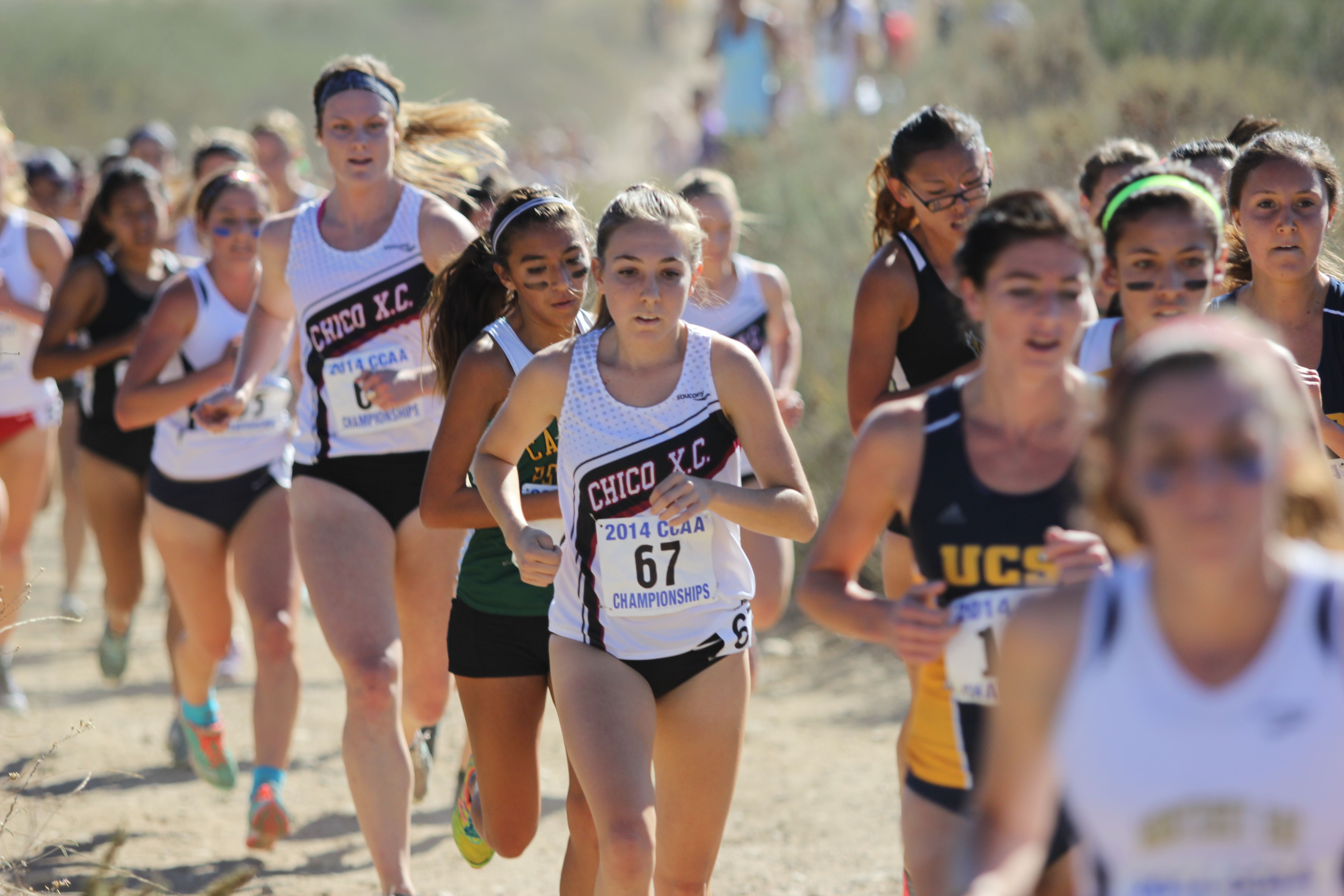 Eventual CCAA Frosh of the Year Camila Turati at mid race, with teammate Olivia Watt following closely.