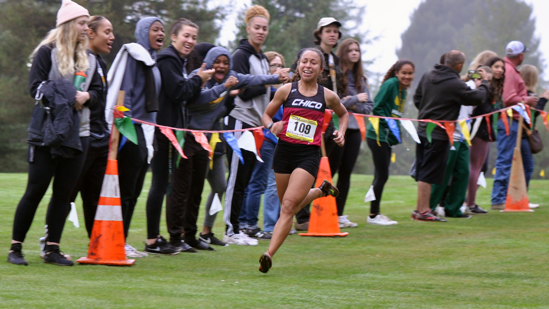 Chico State's Destiny Everett nears the finish line on the way to winning the 2019 CCAA Cross Country Championships title