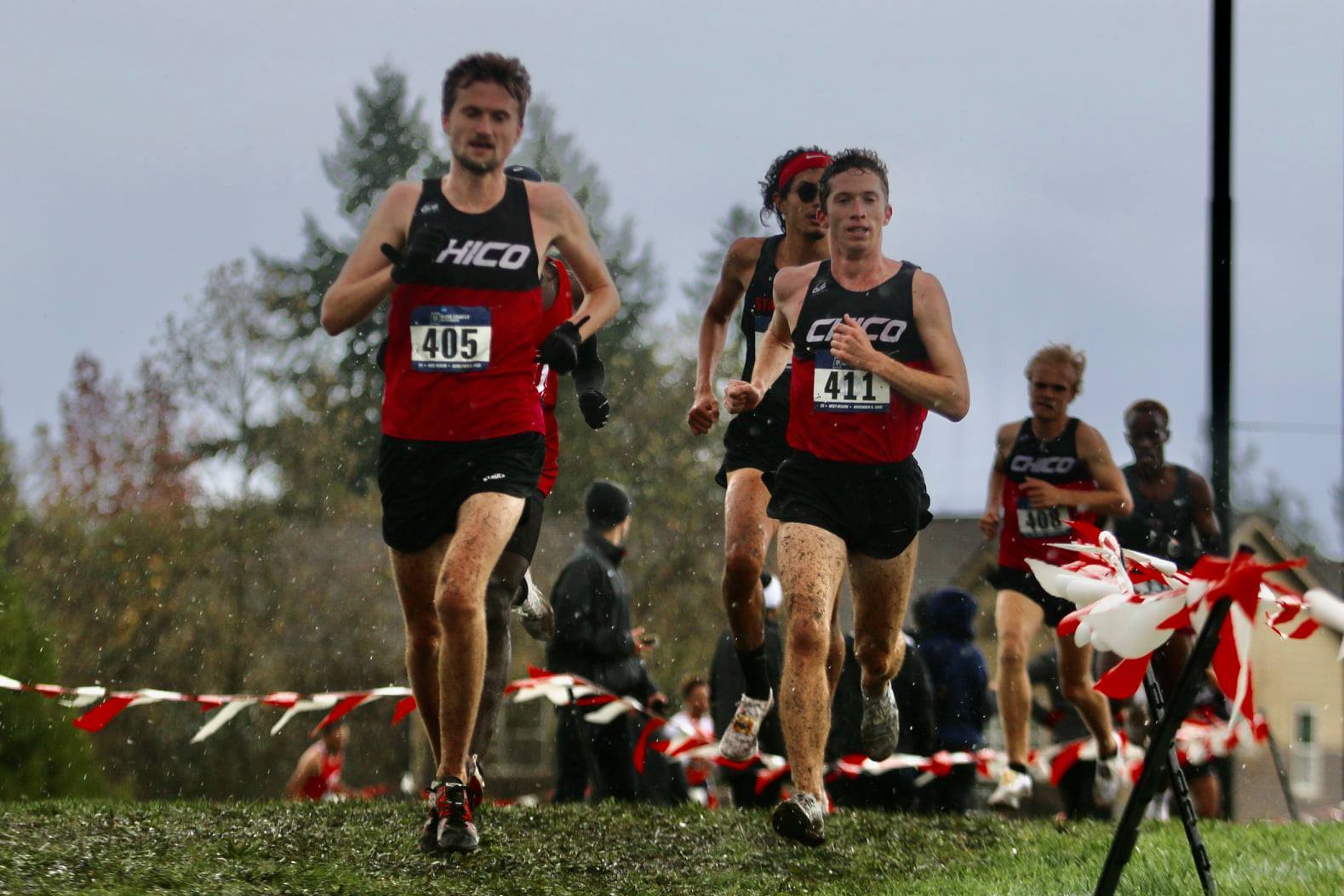 Rory Abberton and Matt Herrera hammering through the muddy rolling hills en route to eventual Top-15 finishes.
