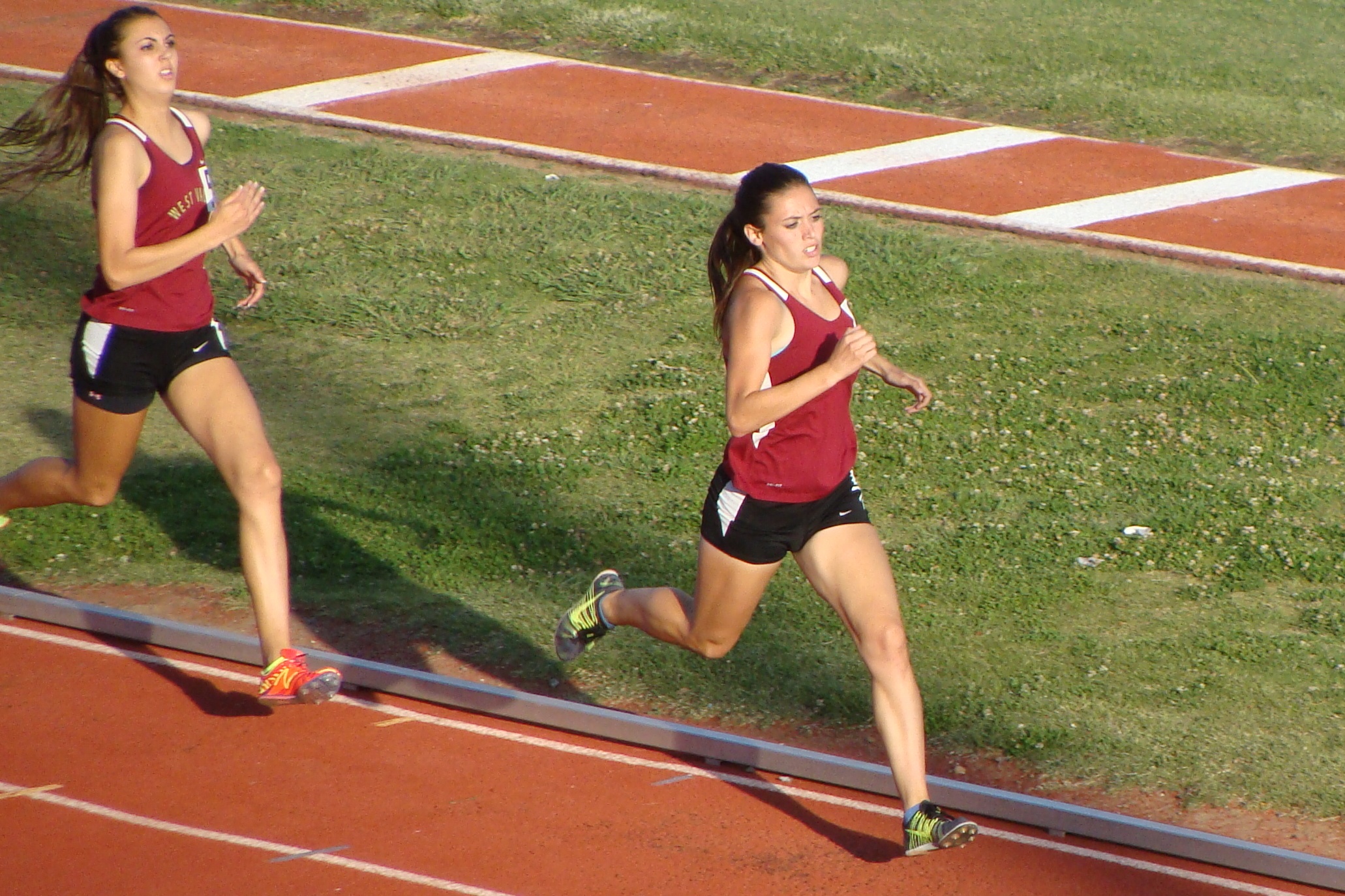 Halfway through the girls 800m race, West Valley's Alexa Flagg leads teammate (& 1600m winner) Jenna Hinkle. Flagg would go on to win second consectutive title in 2:17.17. (TC)