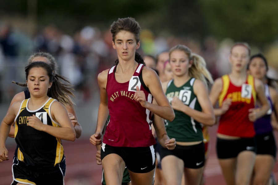 West Valley's Jenna Storms & Enterprise's Natalie Ulloa are the early leaders in the girls 3200m. Storms was an easy winner after Ulloa drops out. (RS)
