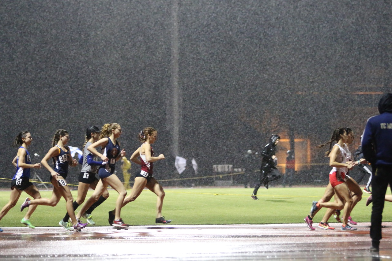 Julie Finn running a 5k in conditions she'll not soon forget @ the Kim Duyst Invite in Turlock