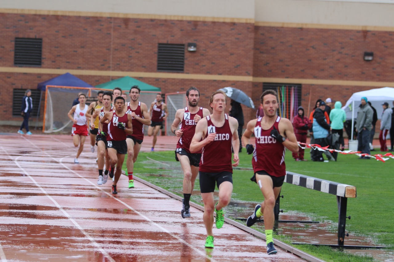 Although the rain let up for the race the winds did not as Kyle Medina leads most of the race during the fastest heat of men's 1500m at the Wildcat Invite.