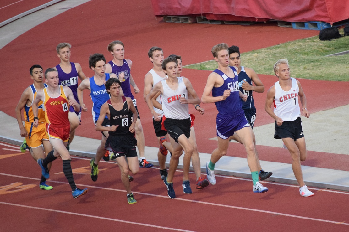 Chico's Jack Emanuel leads a tight field early in the boys 3200. Emanuel would open up a big lead mid race, only to see nearly all of it dissappear on the last lap to Shasta's Andrew Skoy.