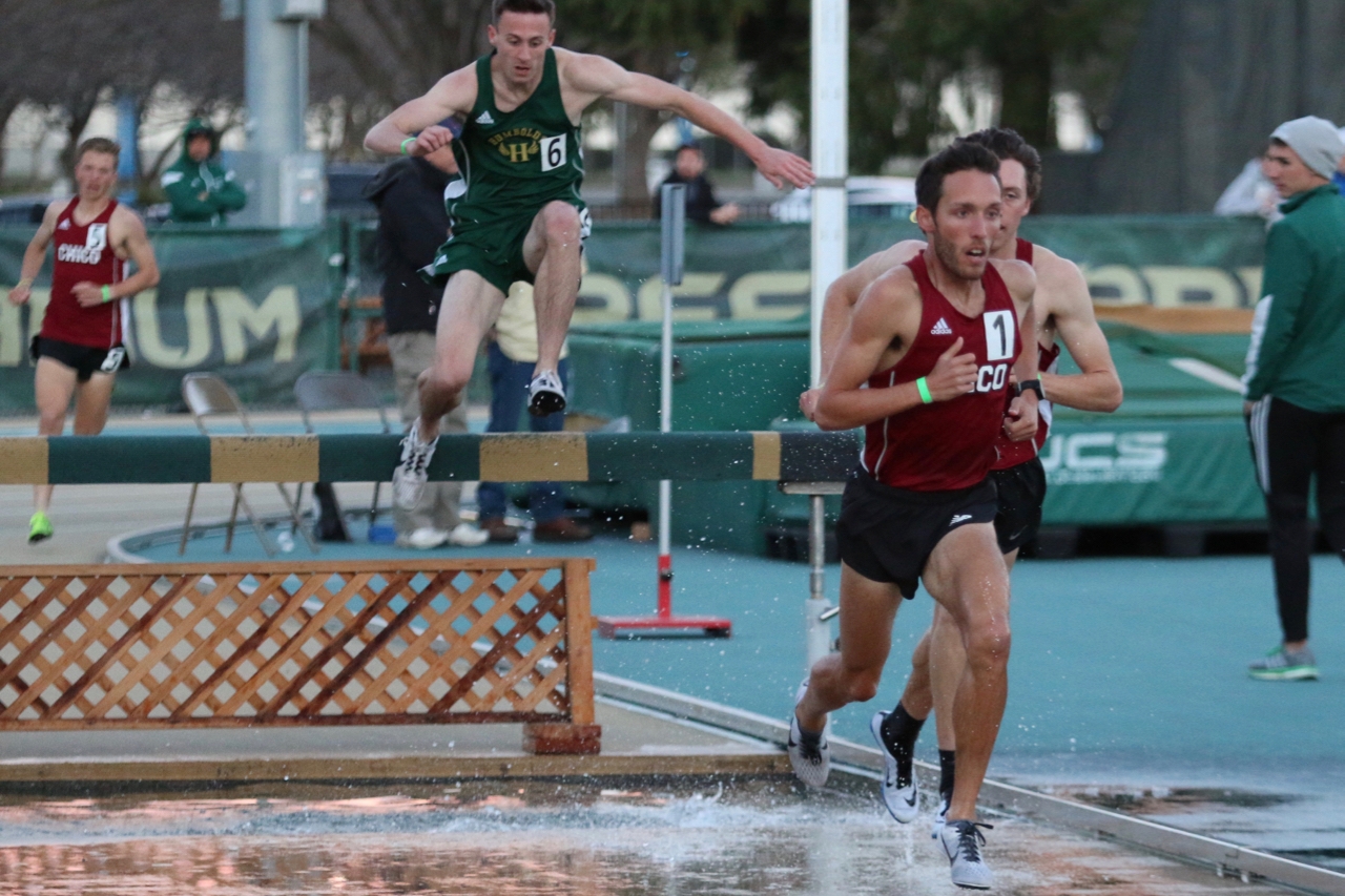 Kyle Medina leading teammate Connor Fisher in the men's steeple.