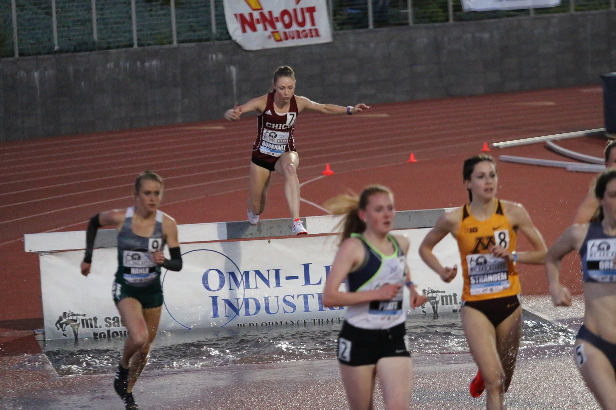 Alex Burkhart chased the lead group throughout the Elite section of the Mt Sac steeple and was rewarded with a 10:09 school record.