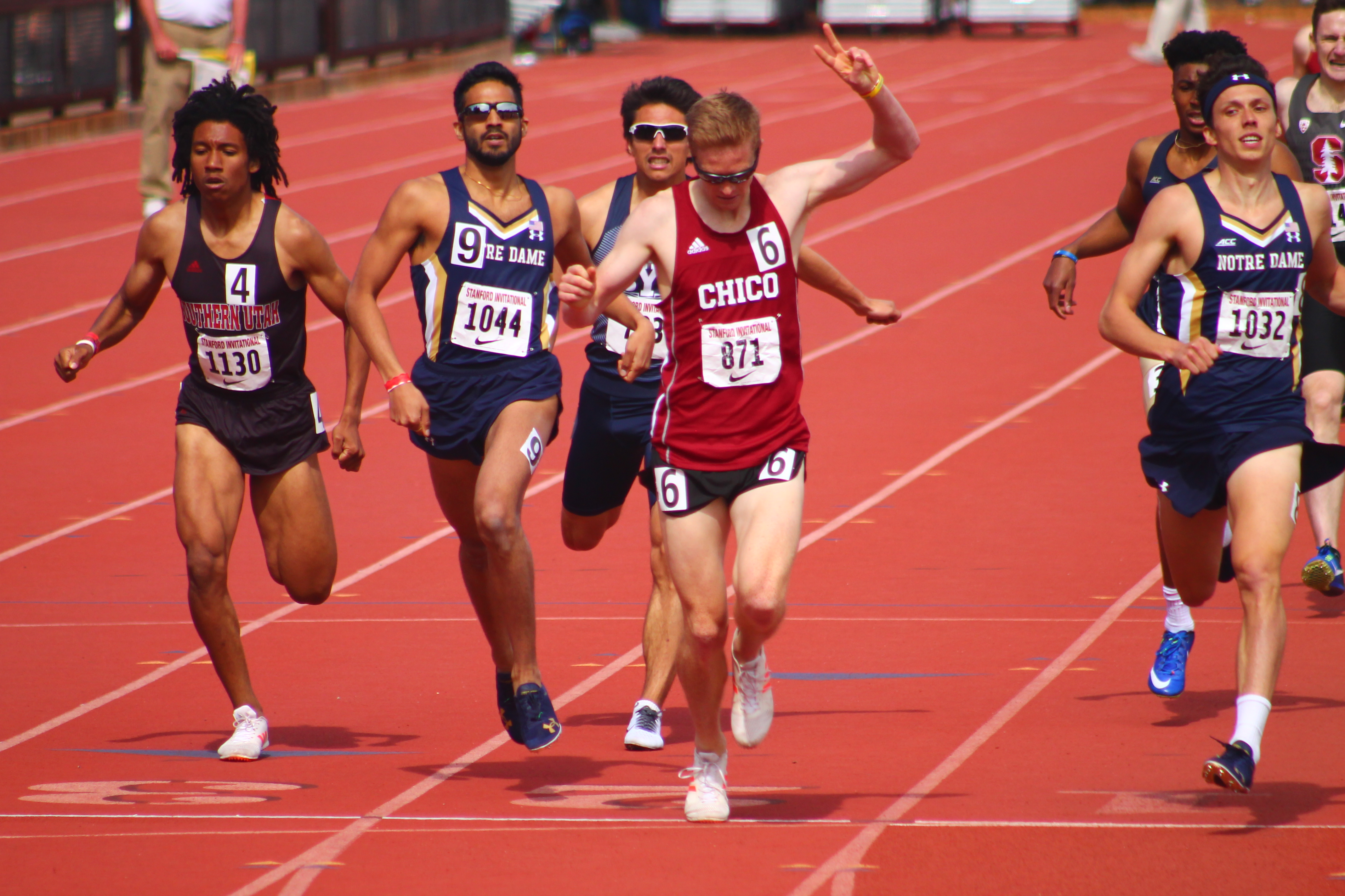 Derek Morton winning his DI heavy heat @ Stanford w/ a 1:50 800m.. His 2 finger pose is repping Division II :v) (photo credit: Scott Kruetzfeldt)