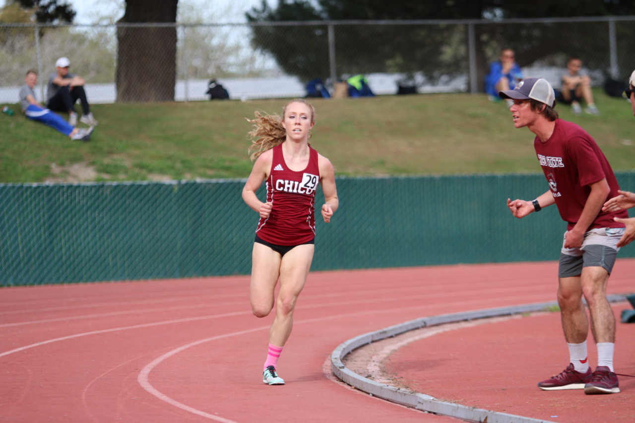 Alex Tucker (RS Frosh) became the youngest 'Cat ever to eclipse the 17:00 barrier w/ her 16:57 heat win. Here teammate Zach Chamberlain cheers her on to victory.