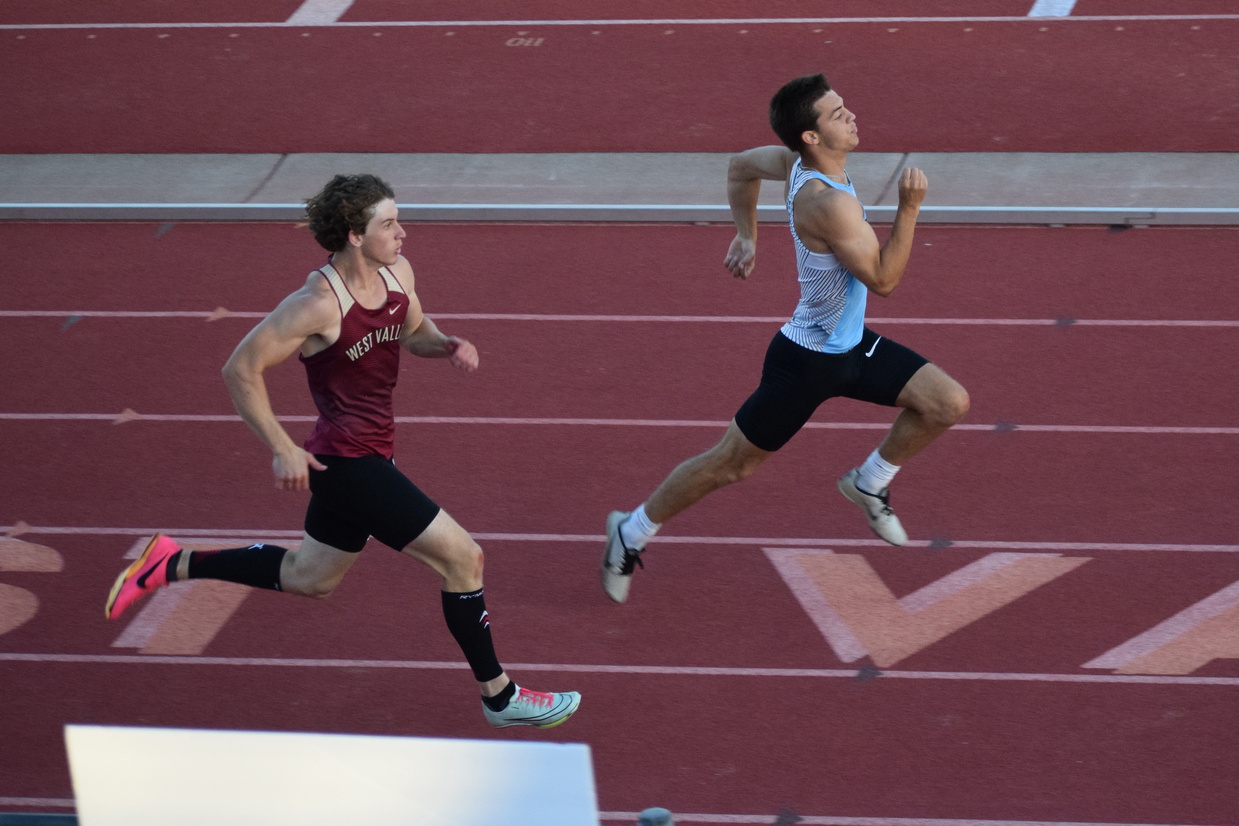 PV's Parker Williams is able to hold off WV's Ian Reynolds to win the 200m title. Reynolds had previously won the 100m.(TC)