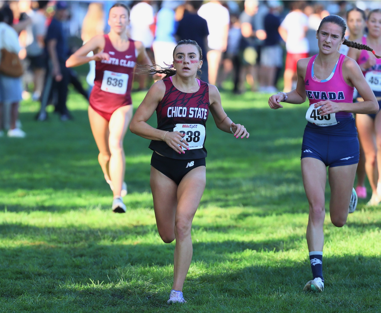True frosh Maya Schiro enjoying another impressive outing with a 21:46 PR.