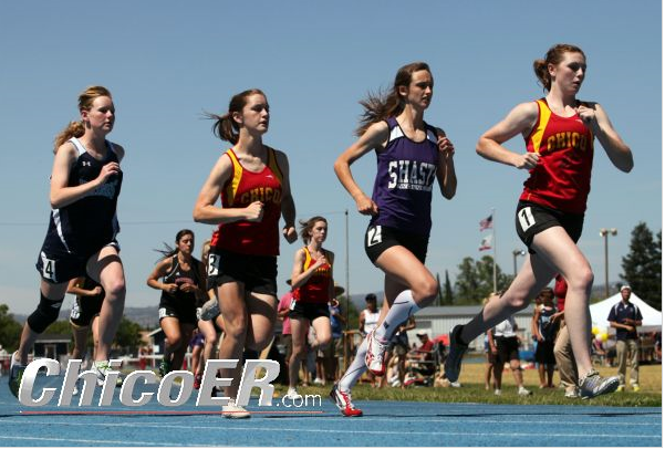 Chico's Kody Atkins has the early lead in the varsity girls 800m over Shasta's Lora James, teammate Amanda Costa and PV's Lindsey Lundberg.