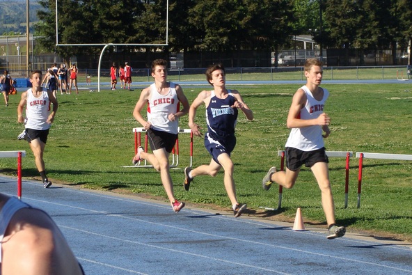 Chico high's Jacob Graber leads PV's Sean Thomas & teammates David Watkins, Liam Monniger one lap into the varsity boys 800m.