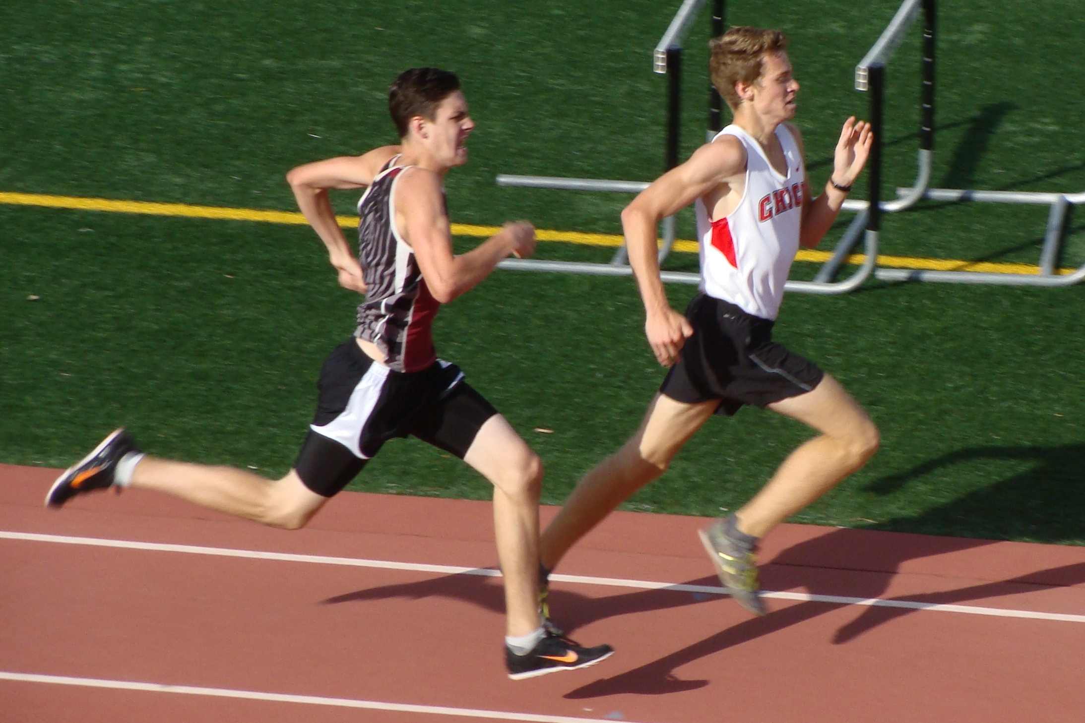 West Valley sophomore Alex Baldwin outkicks Chico's Jacob Graber down the homestretch in the varsity boys 800m to claim the division crown. (TC)