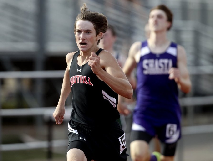 Foothill's Garrison superior home stretch opens up a tight race in the varsity boys 400m. (RS)