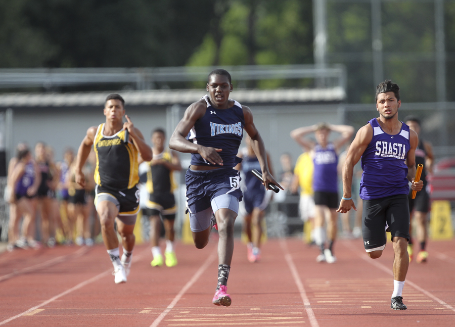 PV's Kevon Cunningham motors toward the finish, anchoring the Vikings to victory over Shasta in the varsity boys 4 X 100 relay. He would also win the 100m & 200m races. (RS)