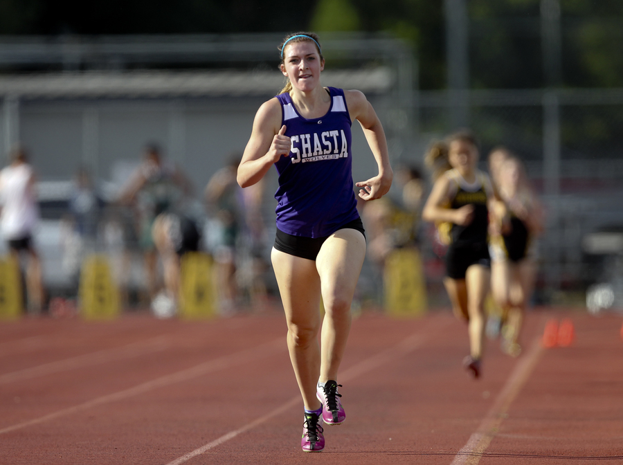 Shasta's Hannah Davis powers down the home stretch to win the varsity girls 1600m, proving her victory over Enterprise's Ulloa the week before was no fluke. (RS)