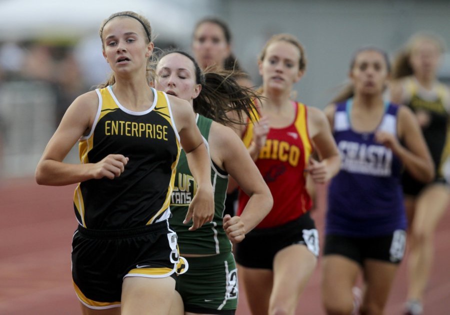 Enterprise's Sydney Pruett overcomes Red Bluff Natalie Renfroe aggressive opening lap the uses a strong second lap to pull away from Red Bluff's Daisy Brose and Chico's Celeste Wilson to win the varsity girls 800m. (RS)