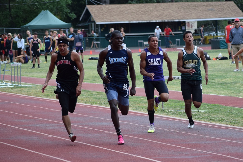 PV's Kevon Cunningham opens up a small gap on Foothill's Chris Rosero in the varsity boys 100m which he holds to the finish. He would repeat the favor in the 200m.