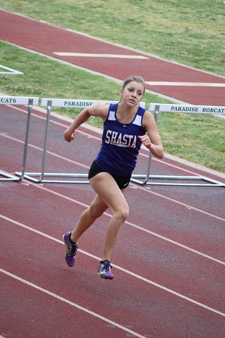 Shasta's Molly Ross rolls to an easy win in the varsity girls 300 hurdles, her second win on the day.