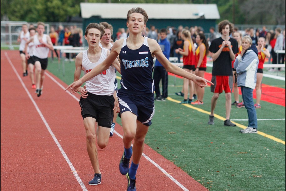 Pv's Kyle Johnson holds off Chico's Charlie Giannini in the varsity boys 1600m with teammate Donovan Freer finishing out the scoring in third. All three are only sophomores.